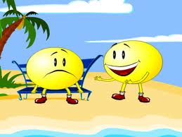 smiley face and sad face on beach