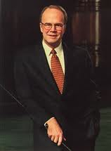 Boice JM holding bible w smile