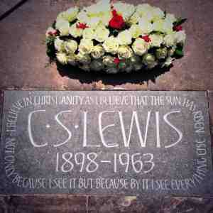 C.S. Lewis on Stone with Flowers